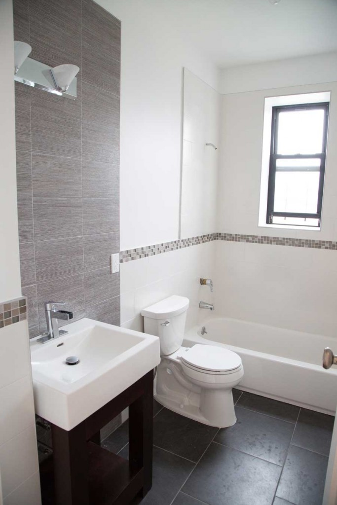 NYC condo bathroom renovation with contemporary tile and fixtures by RDDNY